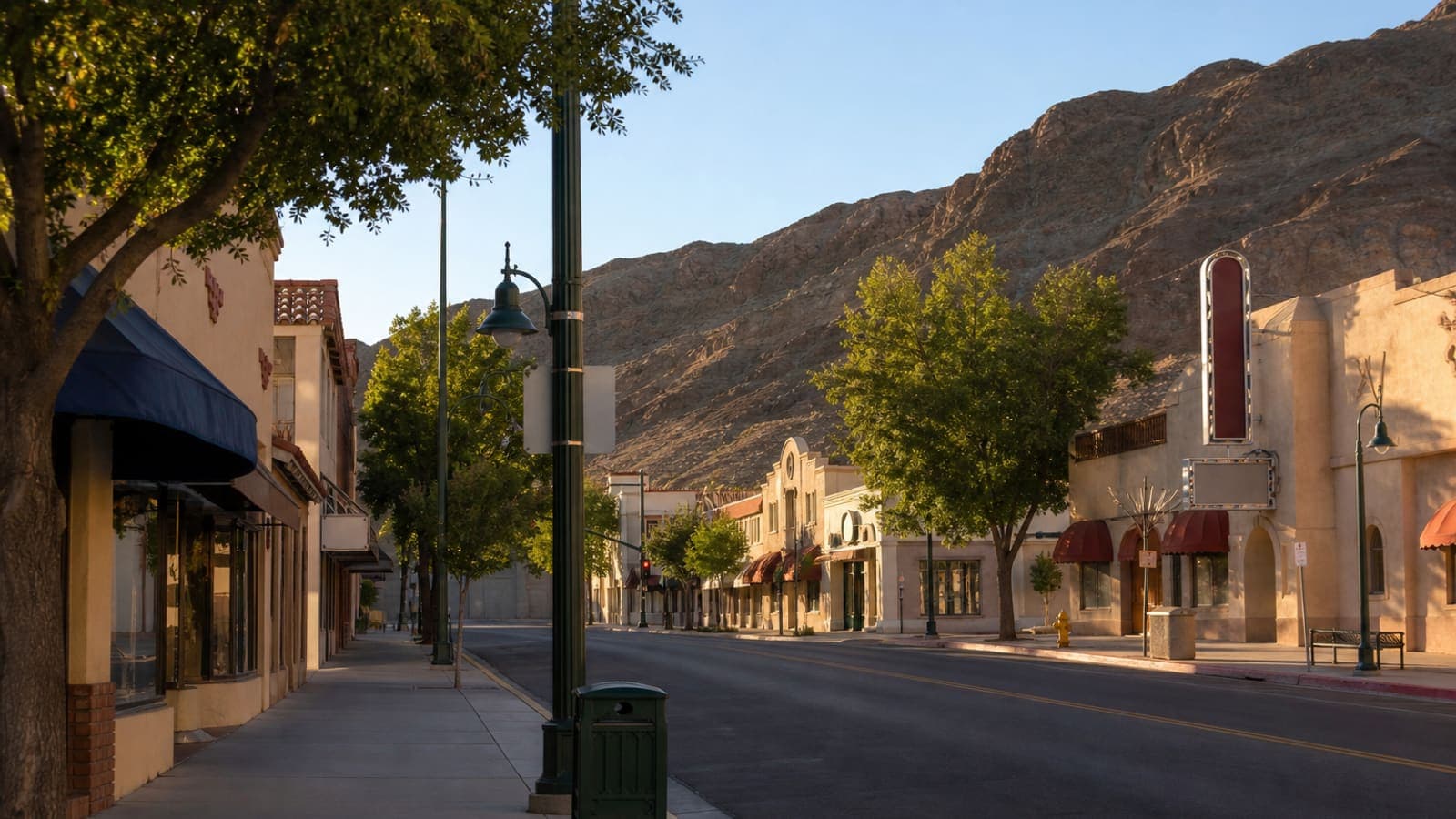 Historic downtown Boulder City, Nevada with vintage storefronts and desert hills